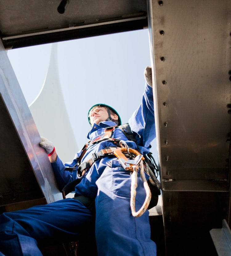 Man going through ceiling exit, highlighting Avendra International's expertise in maintenance and FF&E procurement solutions for the leisure industry